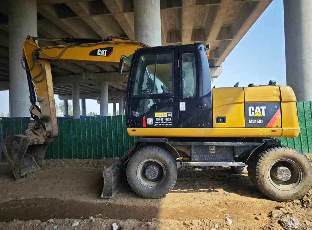 Pelle sur pneus Cat315 d'occasion (2019) à vendre