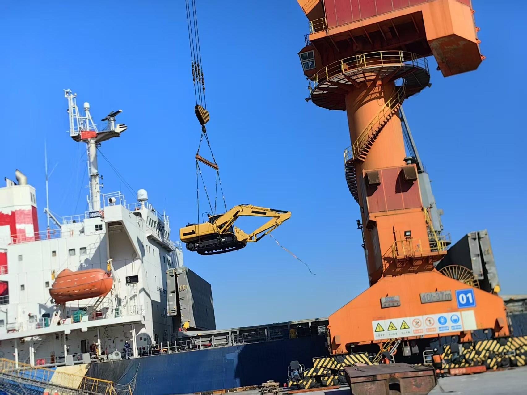 Excavator Being Loaded and Shipped from Port