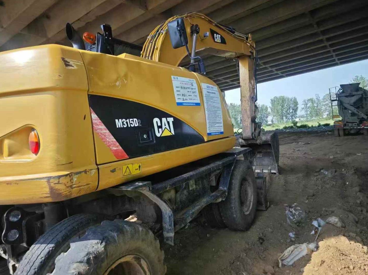 Pelle sur pneus Cat315 d'occasion (2019) à vendre